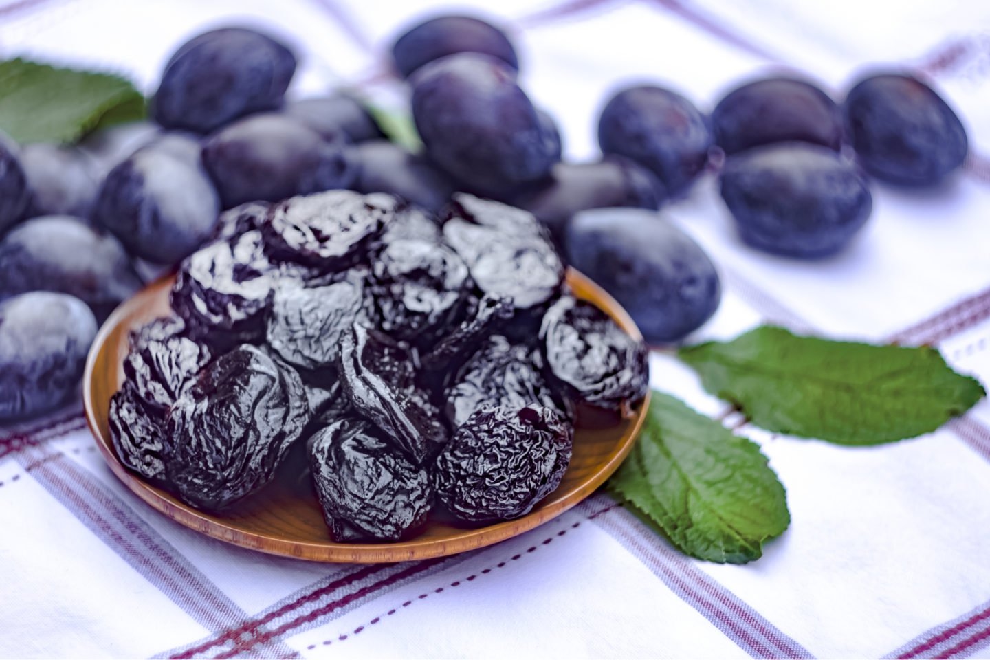 Dried Prunes In A Bowl