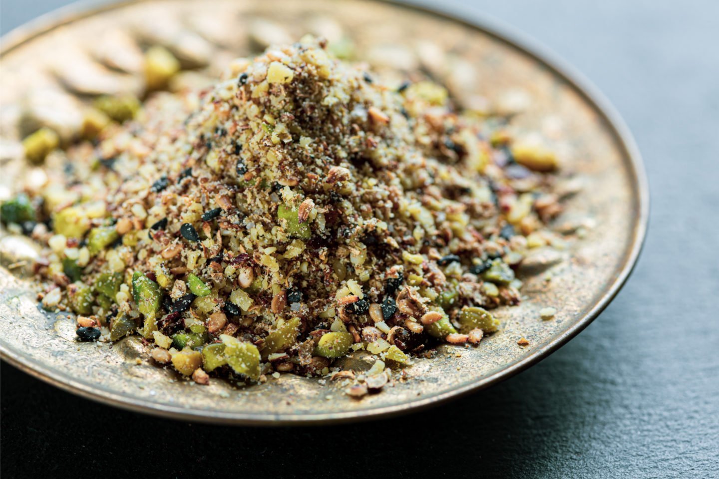 Dukkah Spice Blend Piled On Shallow Plate