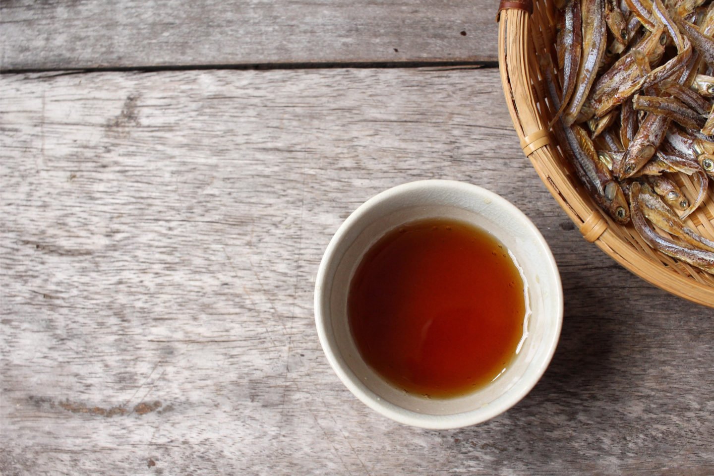 Fish Sauce In Small Bowl On Wooden Table