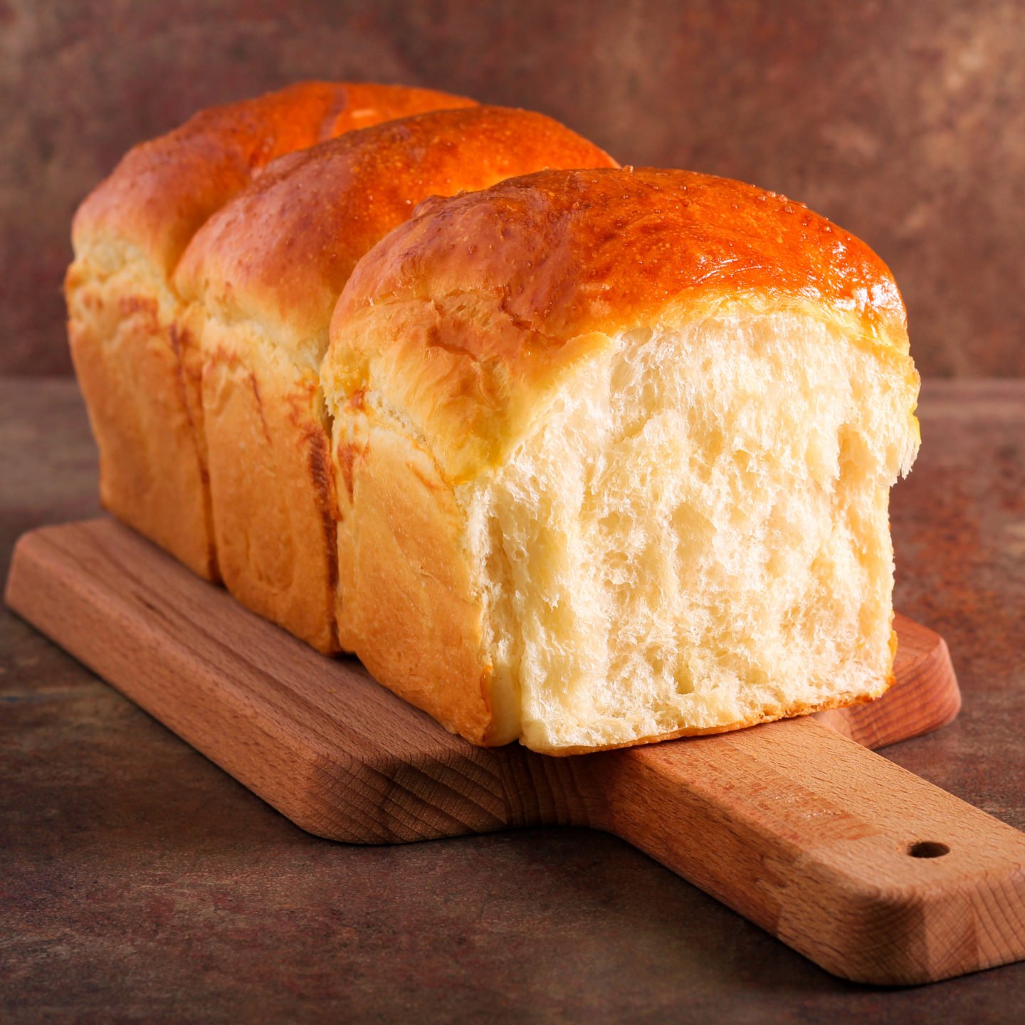 fresh bread on cutting board