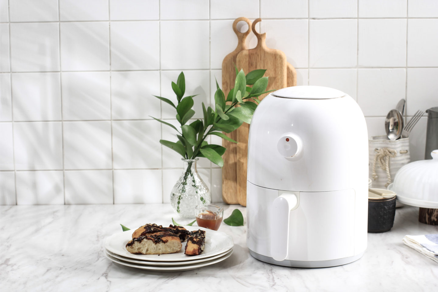 Glass Dishes Beside White Air Fryer