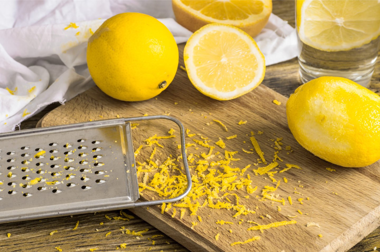 Grated Lemon Zest On Cutting Board