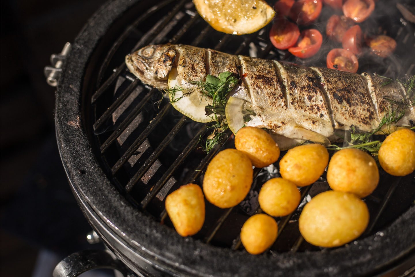 Grilling Fresh Rainbow Trout With Potatoes Cherries
