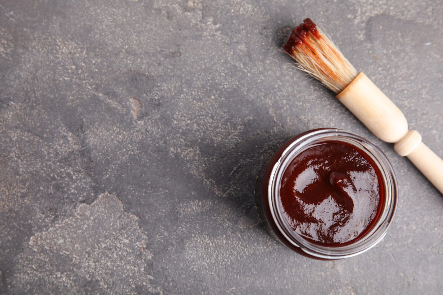 Jar Of Barbecue Sauce With Brush