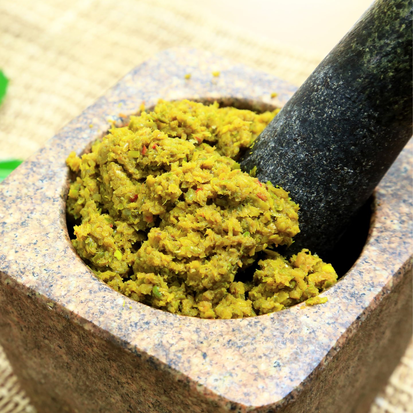 lemongrass paste kreung in mortar and pestle