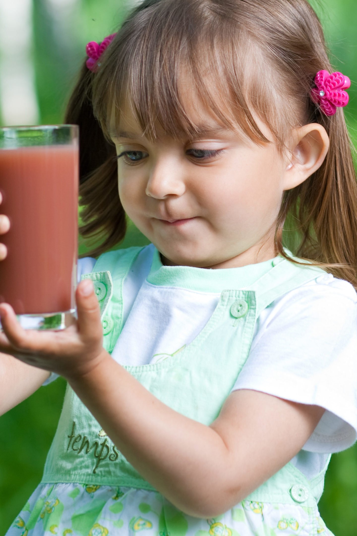 Little Girl With Glass Of Plum Juice Edited