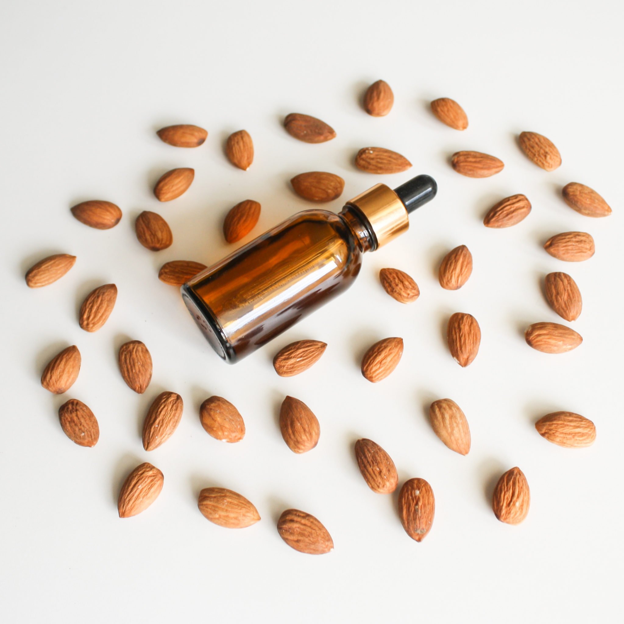 small dropper bottle of almond extract