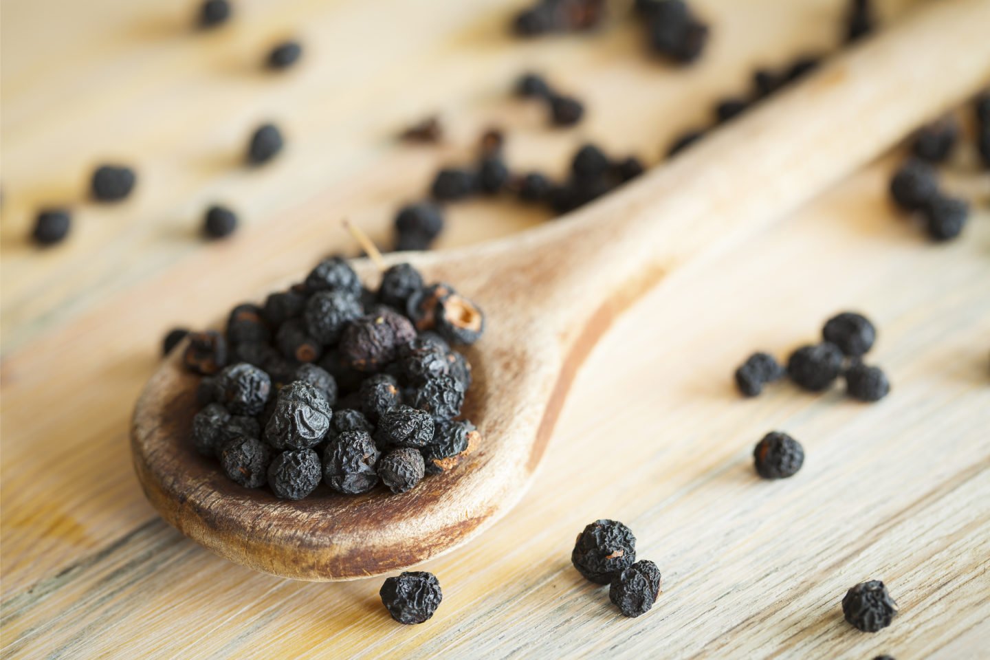 Tasmanian Peppercorns In Wooden Spoon