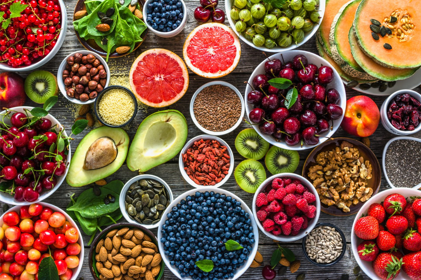 Various Fruits And Nuts In Bowls