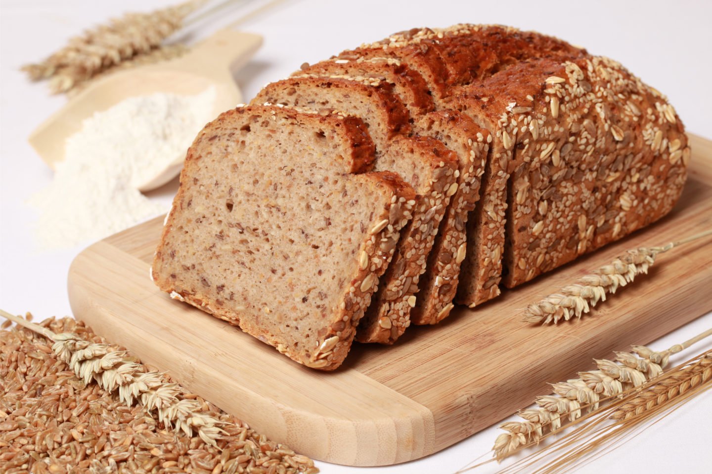 Whole Wheat Bread Slices On Cutting Board