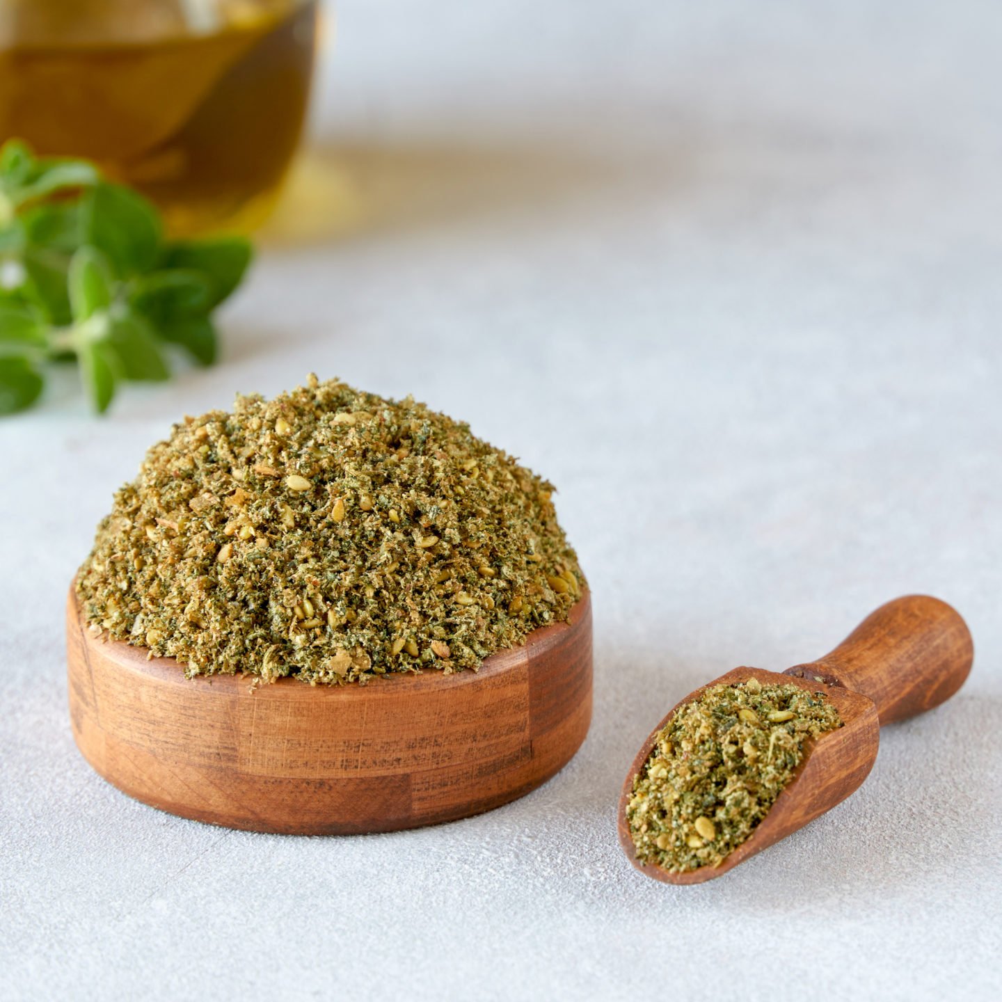 zaatar mixed spice in wooden bowl and spoon