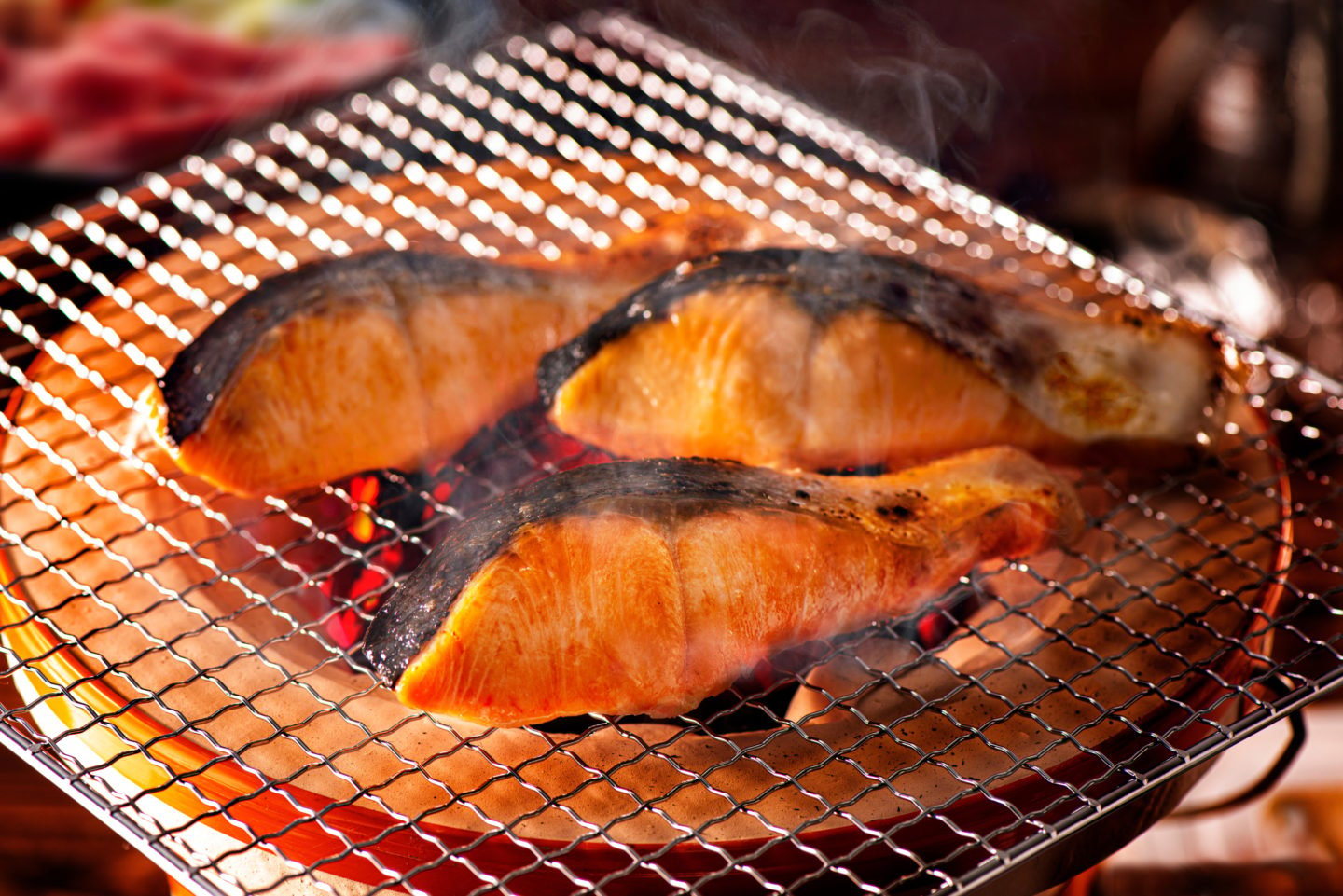 Grilling Salmon Over Fire