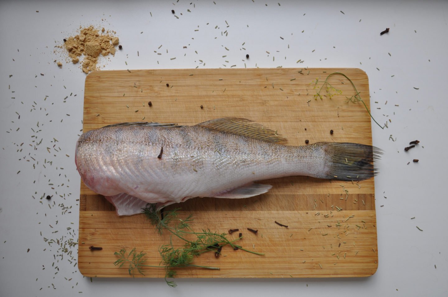 Headless Fish On Cutting Board