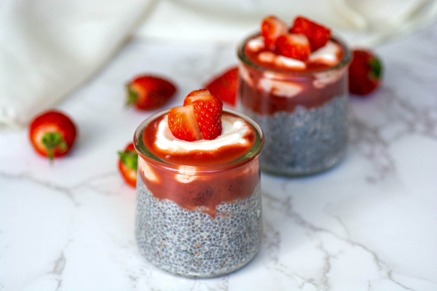 keto chia pudding topped with strawberries
