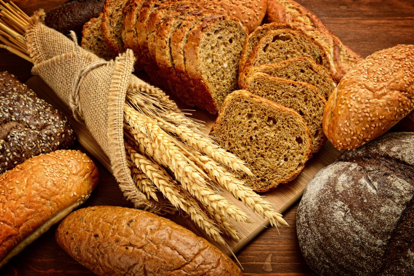 whole grain bread with wheat stalks