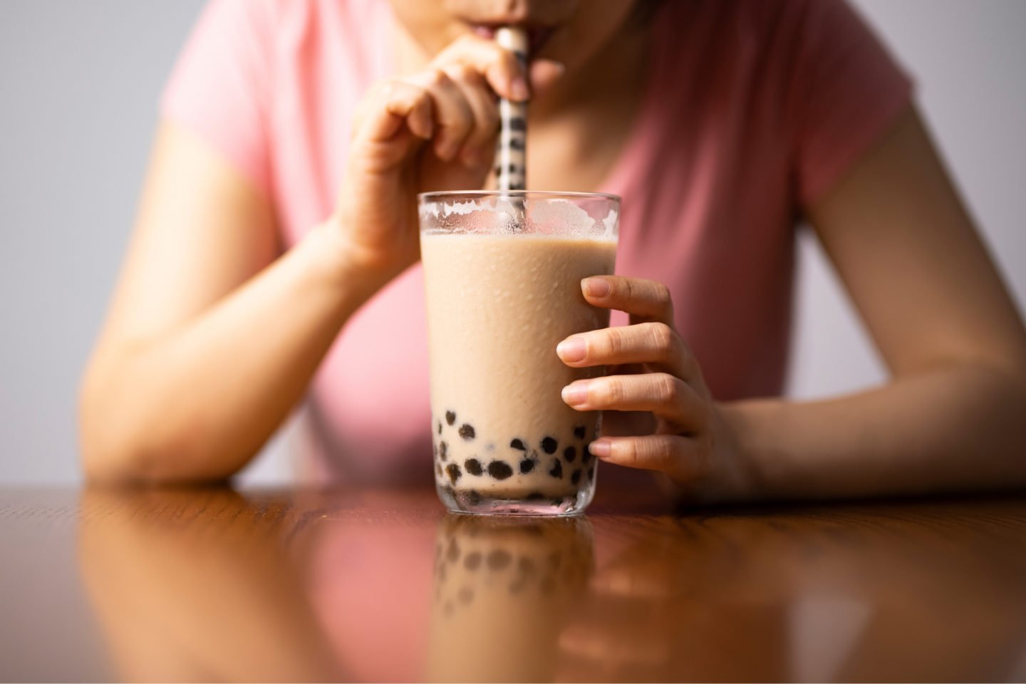 woman drinking bubble tea