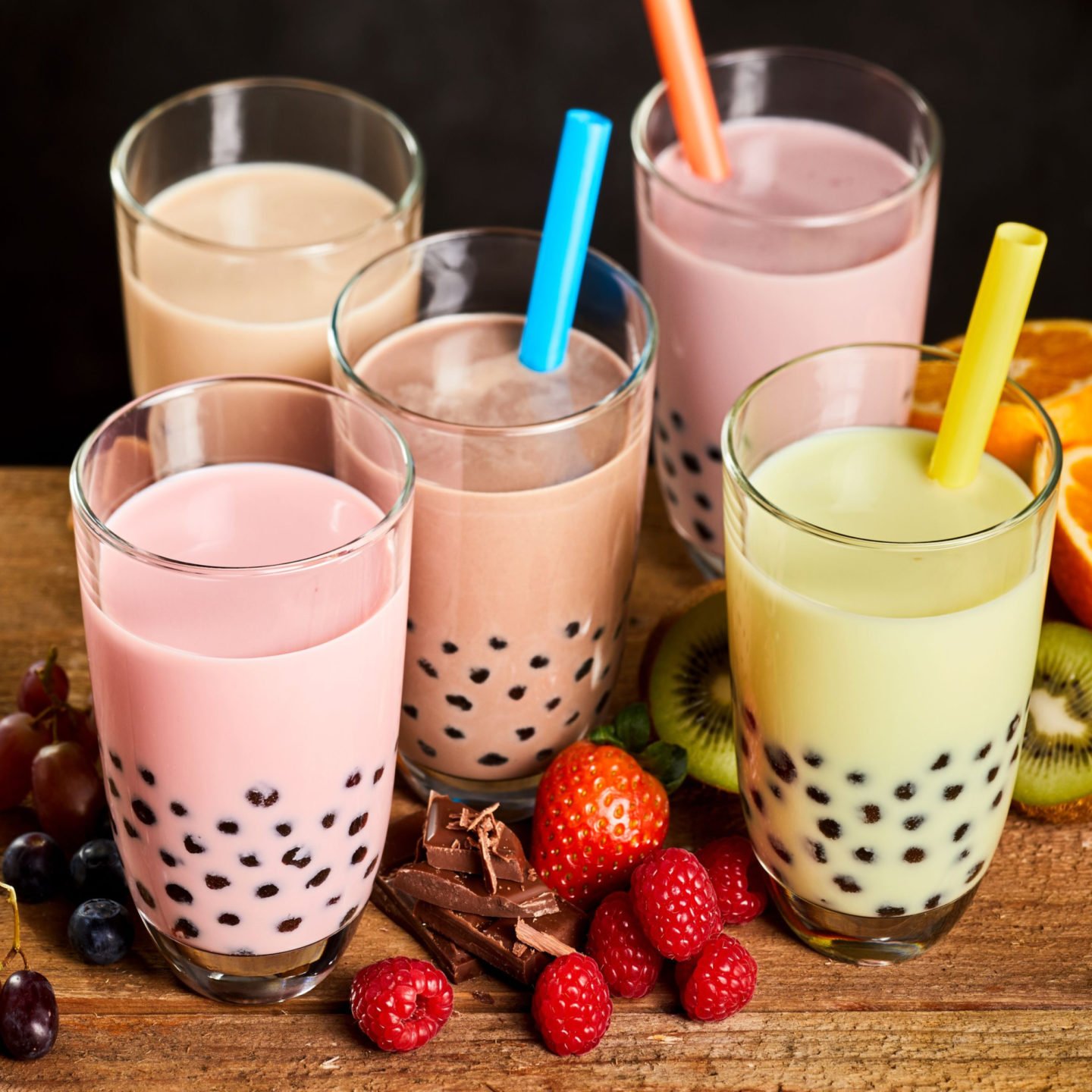 boba tea flavors in glasses with straws