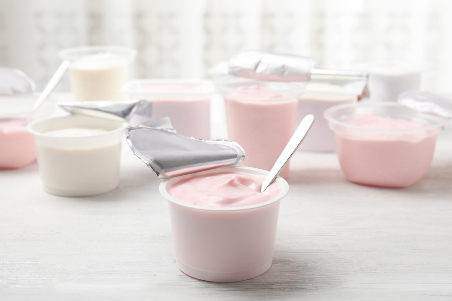 flavored yogurt in cups