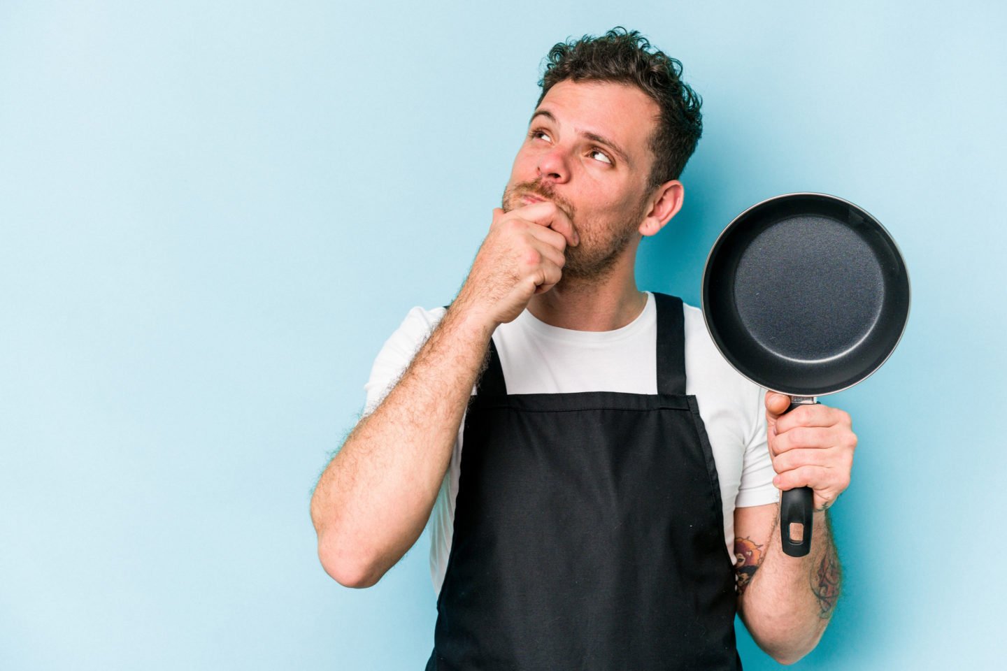 guy holding a small pan