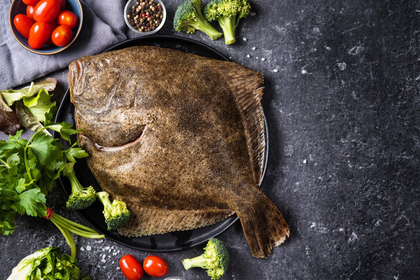 halibut with veggies on a plate