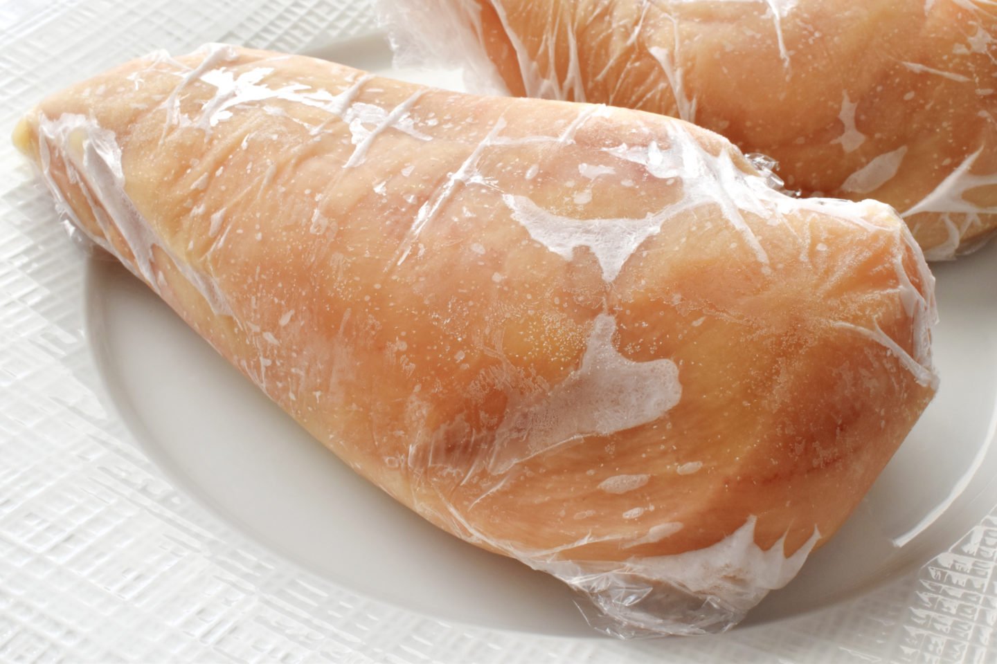 Plastic Wrapped Frozen Chicken