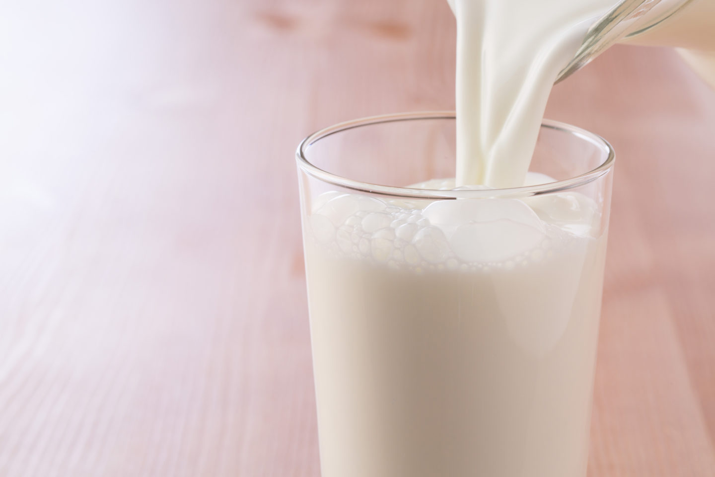 Pouring Milk Into Glass