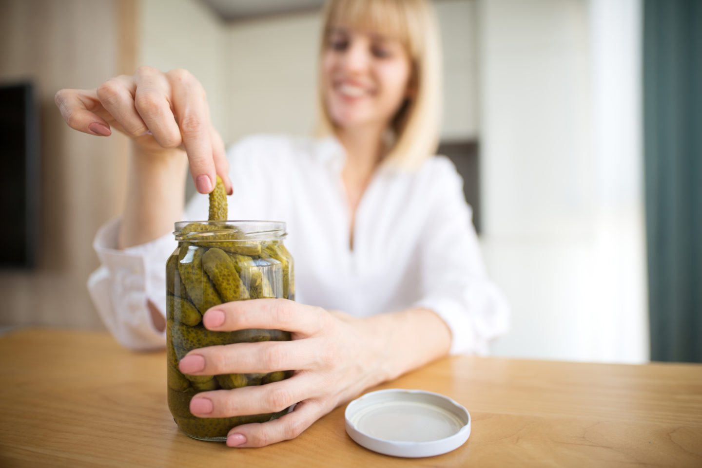 Woman Eating Pickles