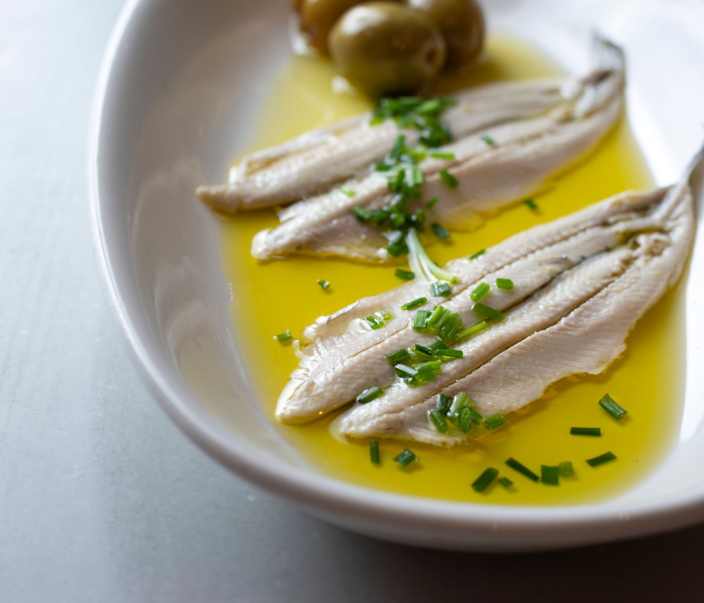 anchovies marinated in vinegar and olive oil