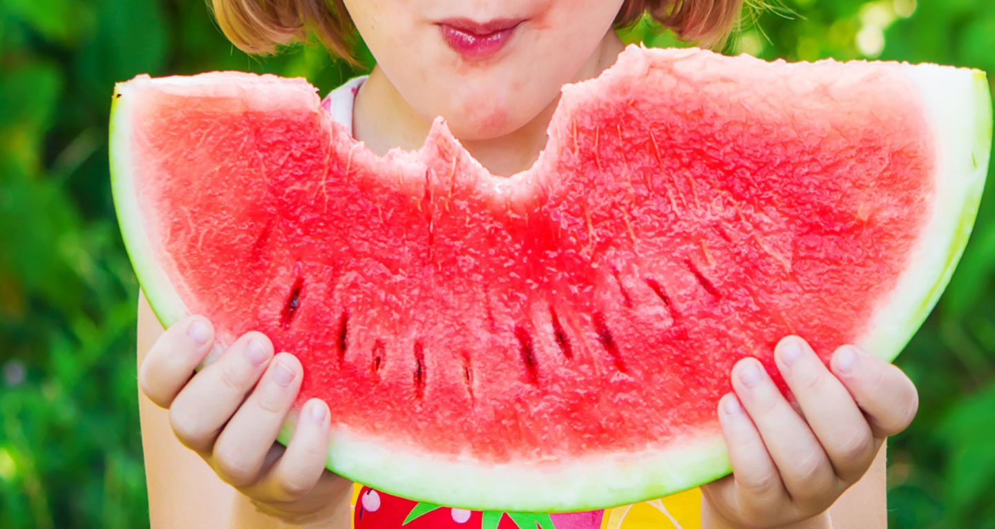 girl eating watermelon