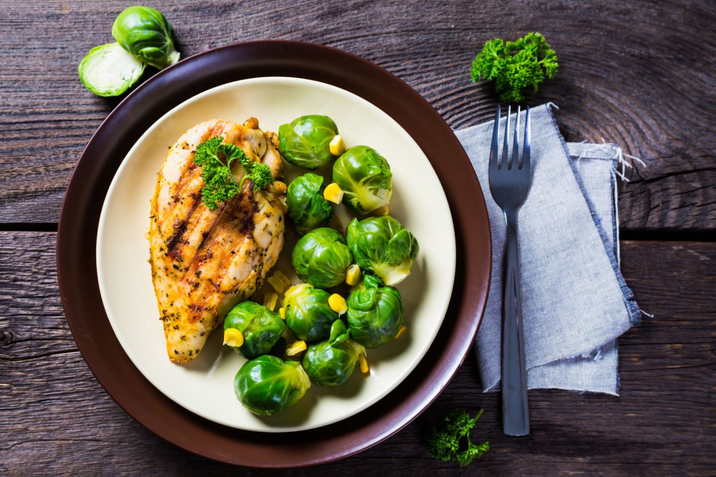 grilled chicken served with brussels sprouts 