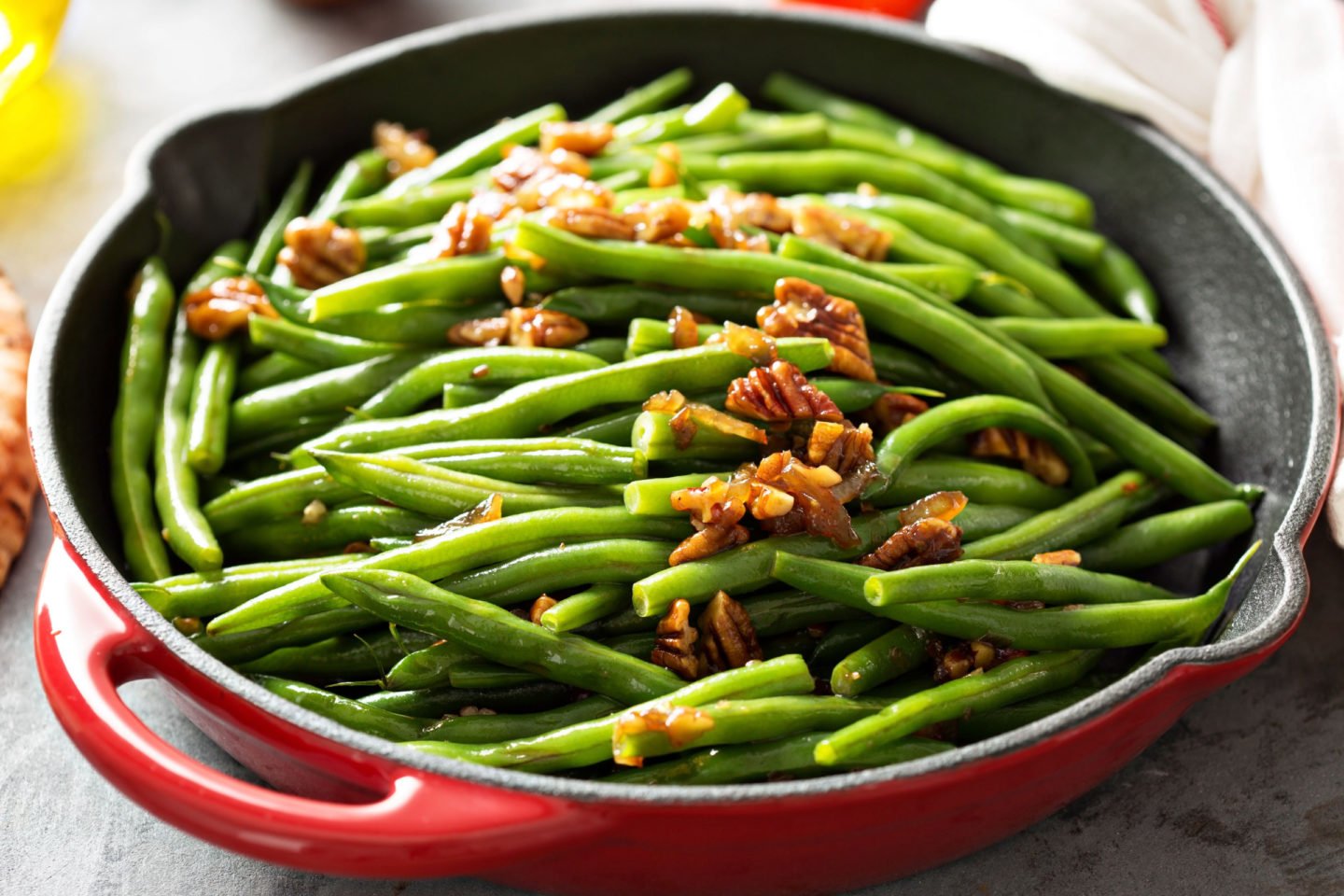 sautéed green beans topped with caramelized pecans and shallots
