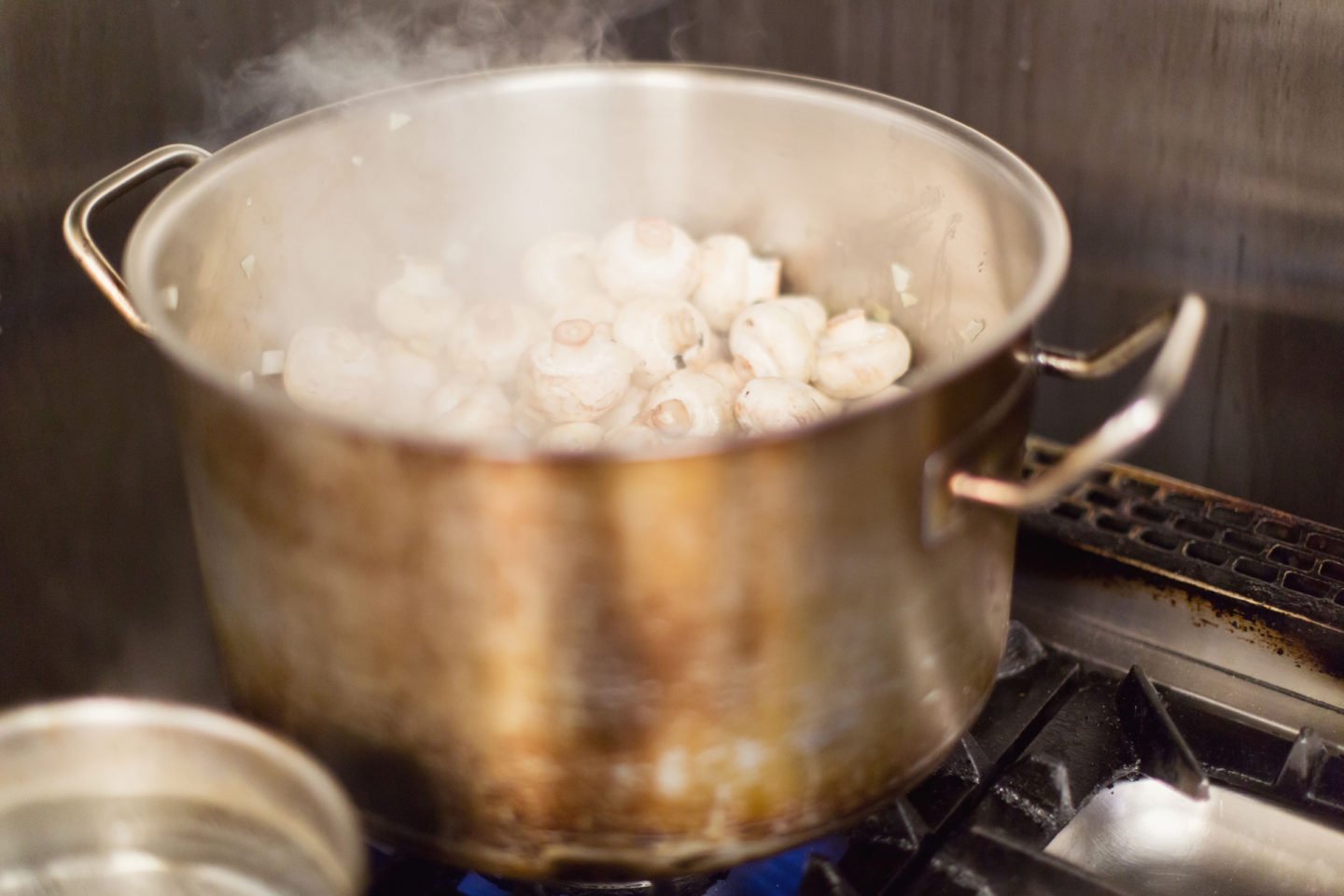 boiling mushrooms in pot