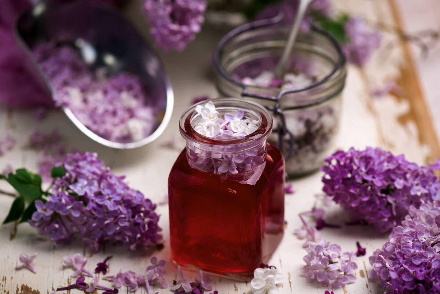 lilac syrup in glass jar