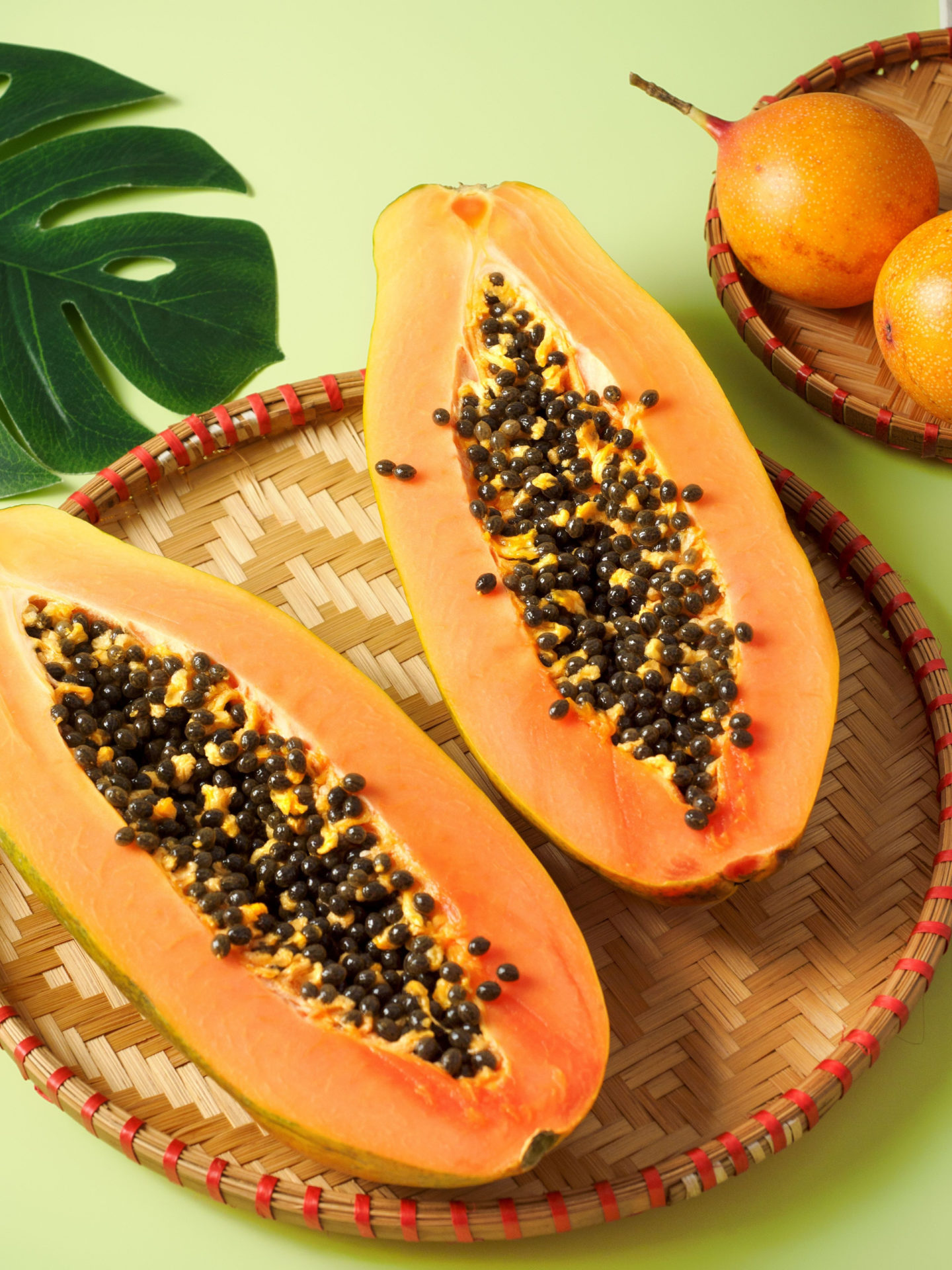 two halves of a papaya fruit