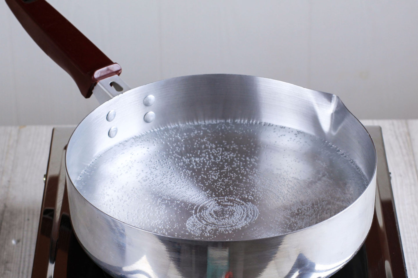 water starts to simmer in pan