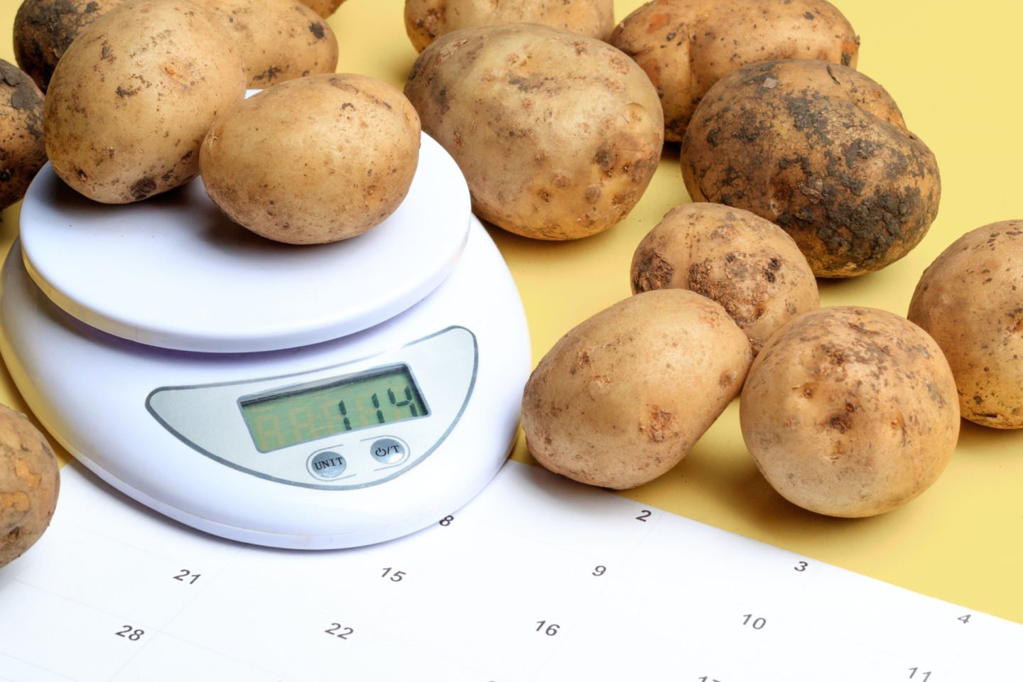 White Potatoes On Weighing Scale