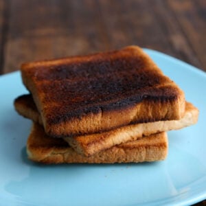 burnt toast on blue plate