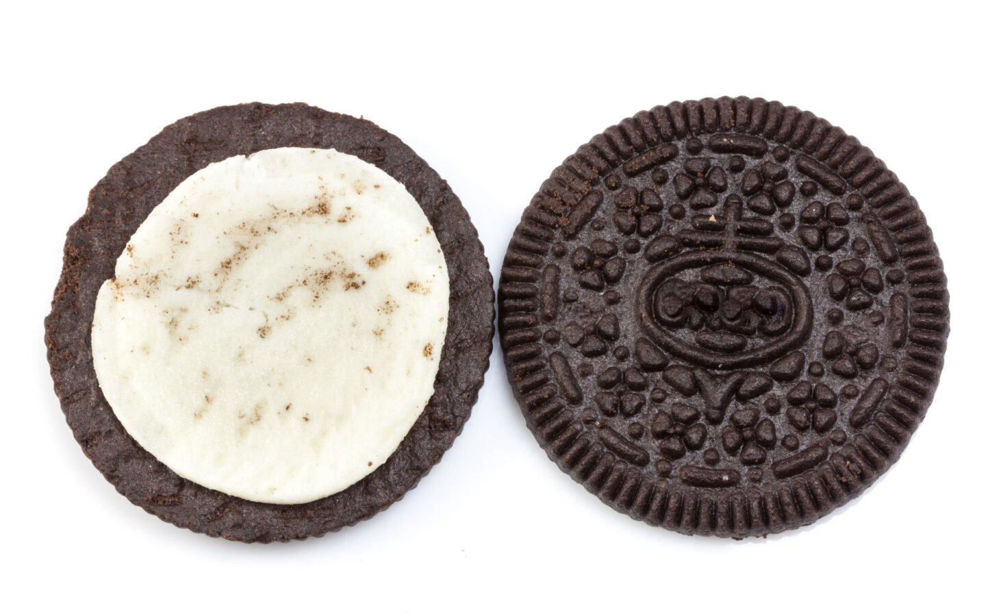 close up image of oreo cookie with cream filling