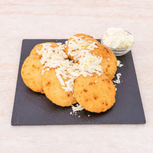 cornmeal fritters topped with cheese