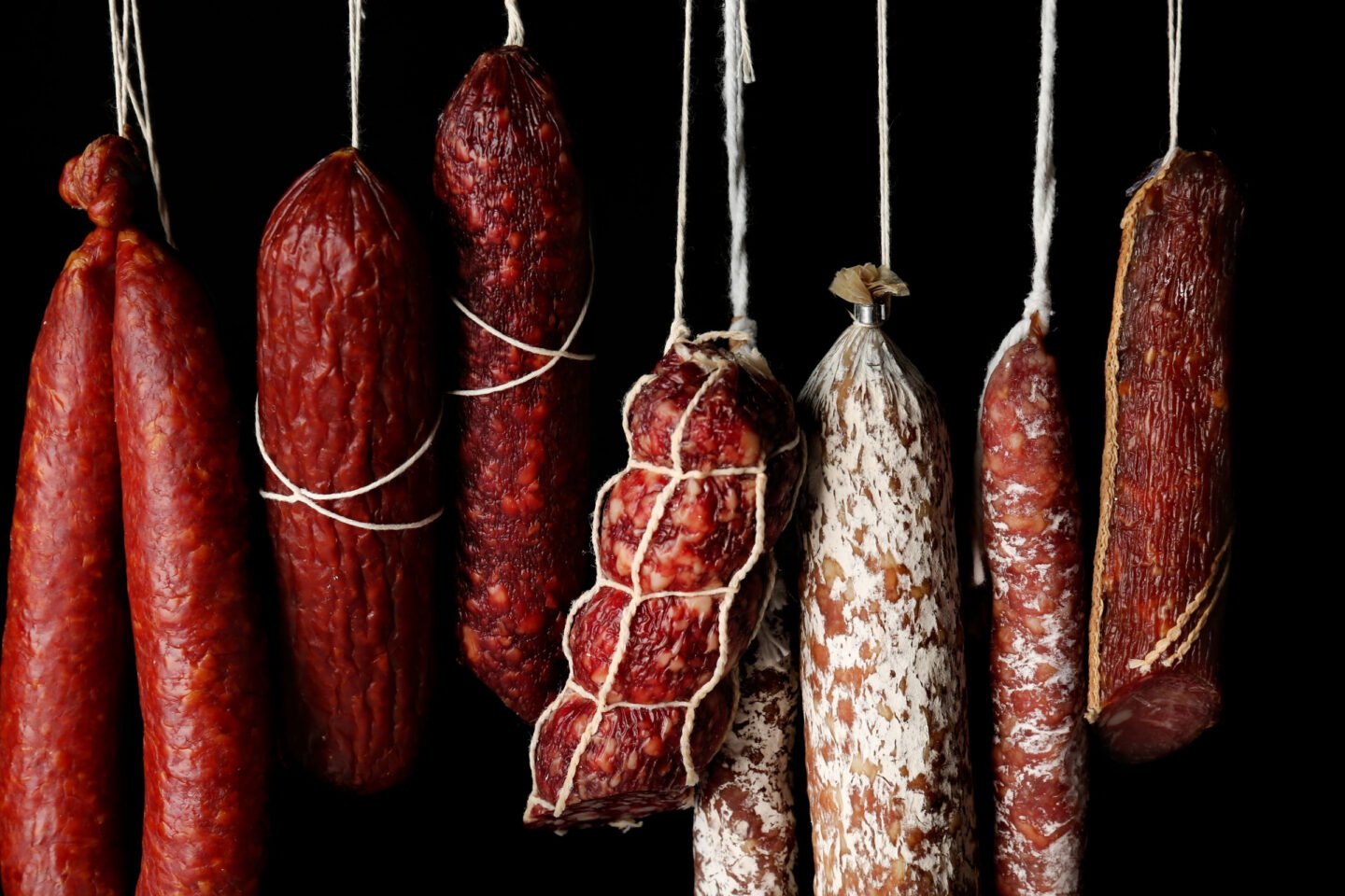 different sausages hanging