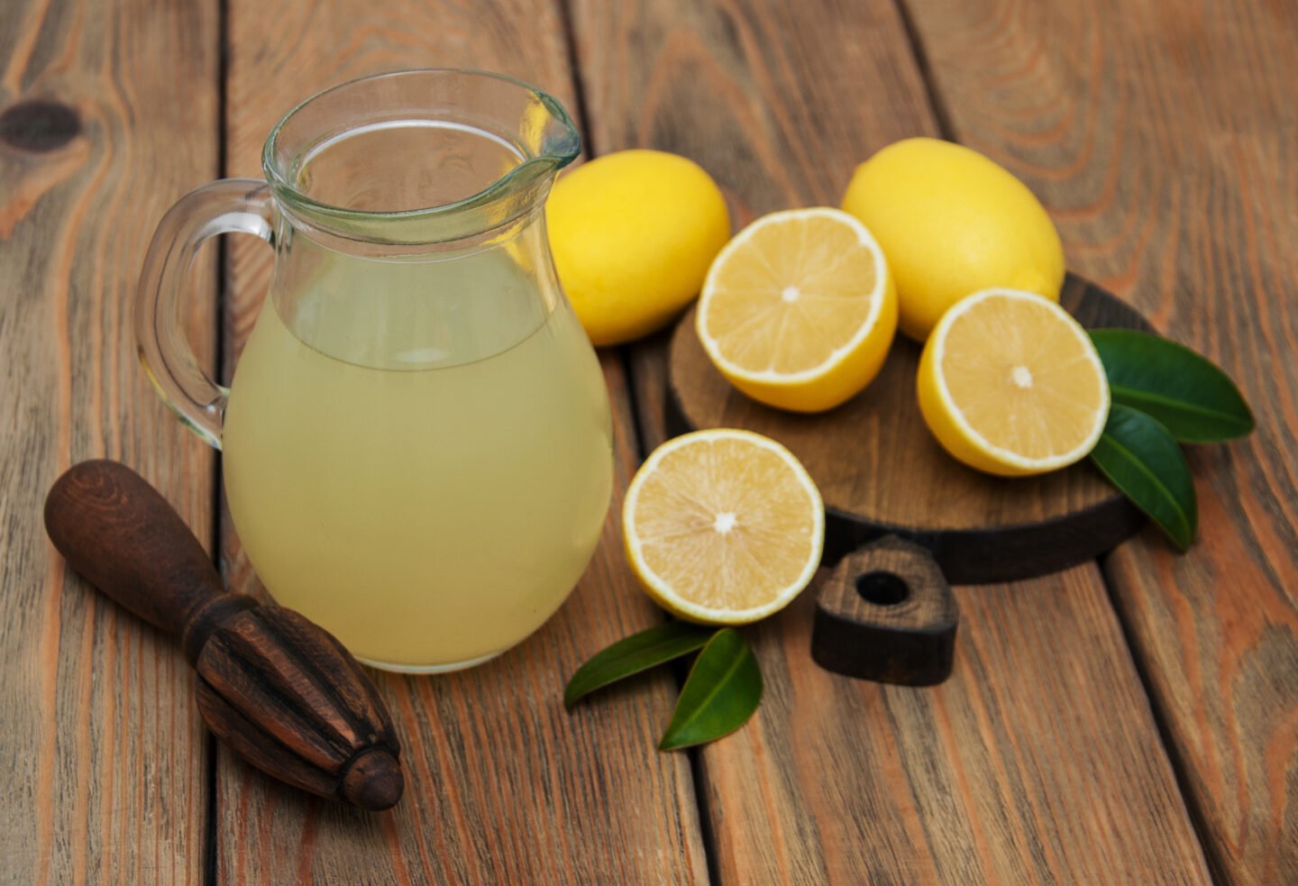 Jar,Of,Lemon,Juice,On,A,Old,Wooden,Table