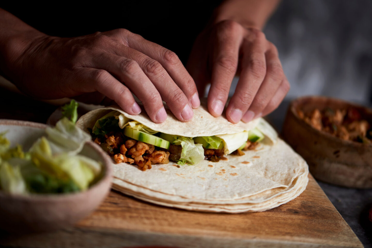 man making a burrito