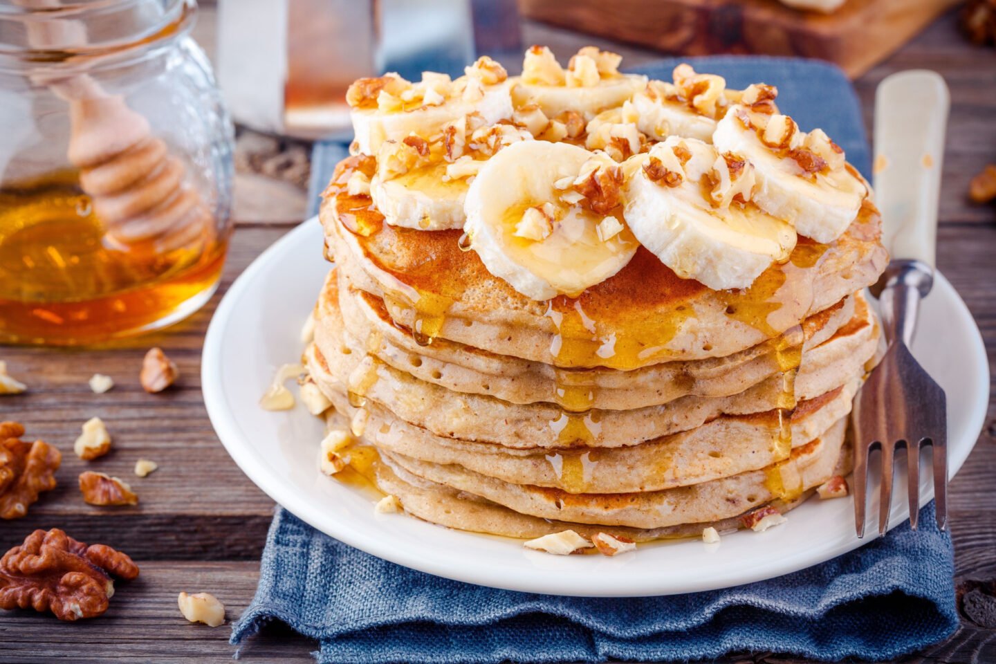 oatmeal pancakes with banana walnuts and honey