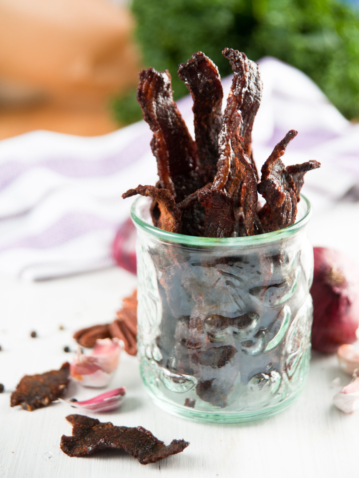 seasoned beef jerky strips in glass jar