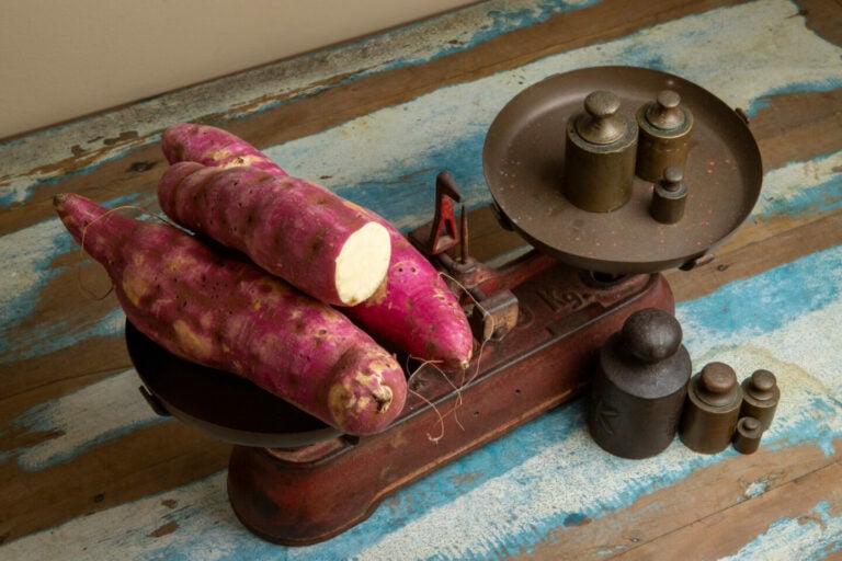 How Much Do Sweet Potatoes Weigh Everything You Need To Know   Sweet Potatoes On A Vintage Weighing Scale 768x512 