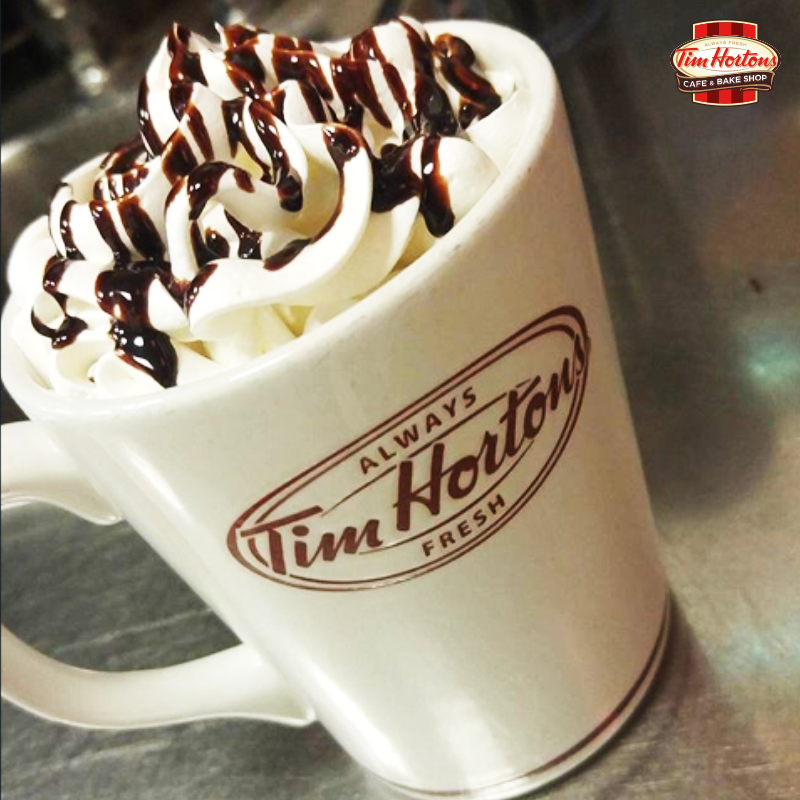tim hortons french vanilla cappucino with whipped cream and chocolate syrup on top