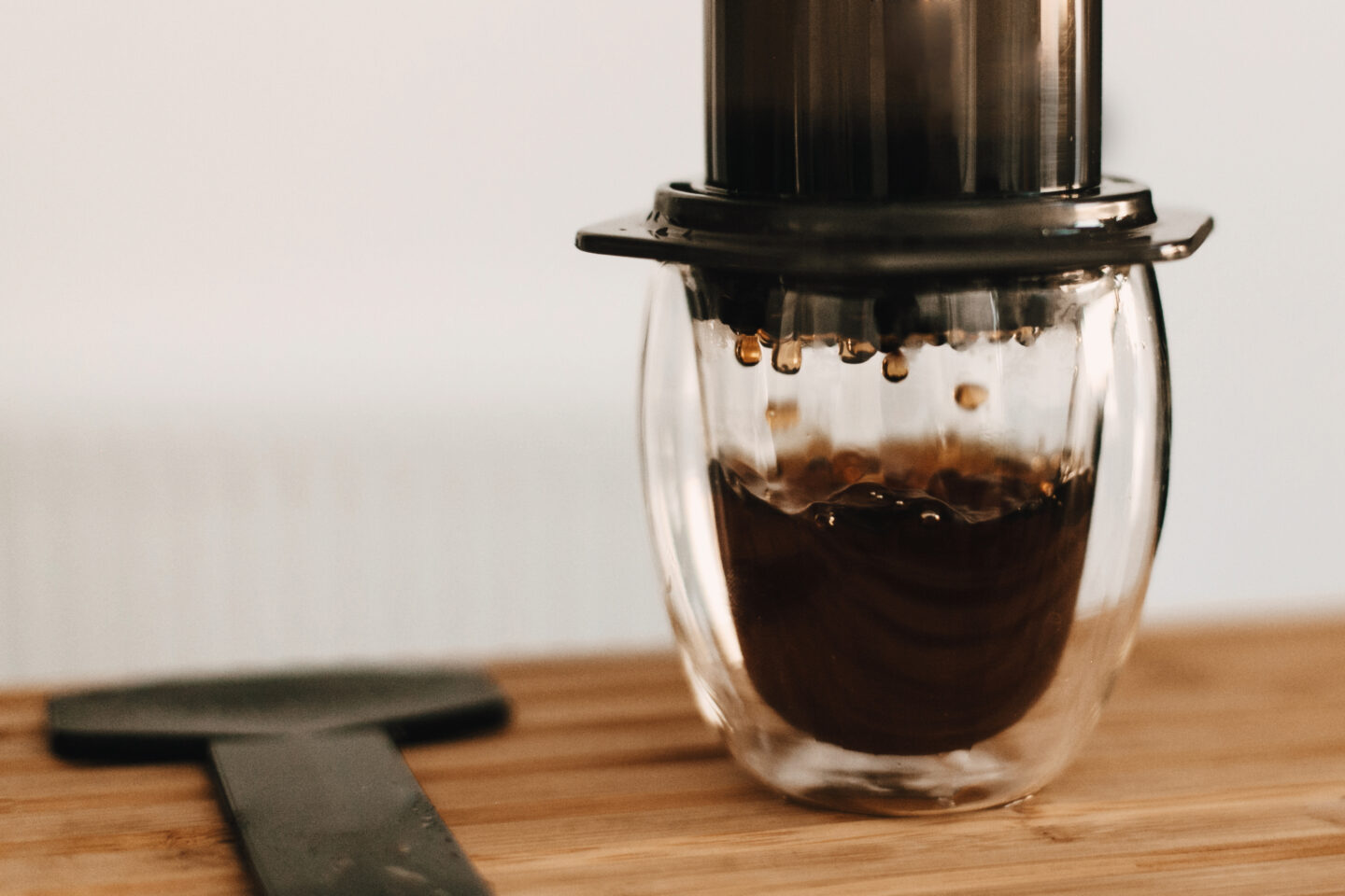 Coffee,Drops,Closeup,In,Glass,,Aeropress,,Alternative,Coffee,Brewing,Method.