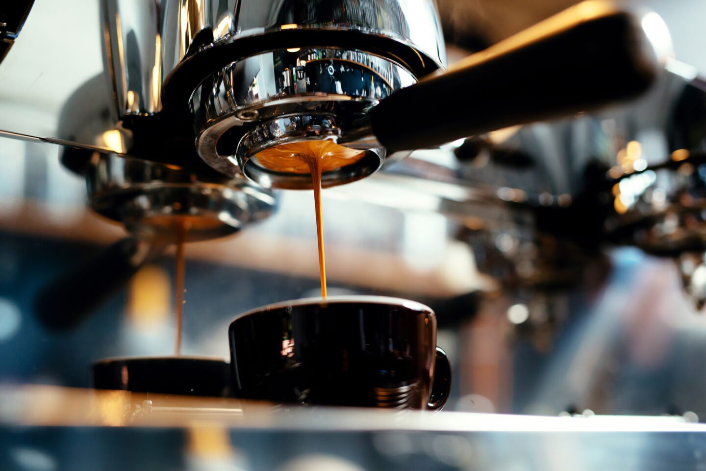 Close up,Of,Espresso,Pouring,From,Coffee,Machine.,Professional,Coffee,Brewing
