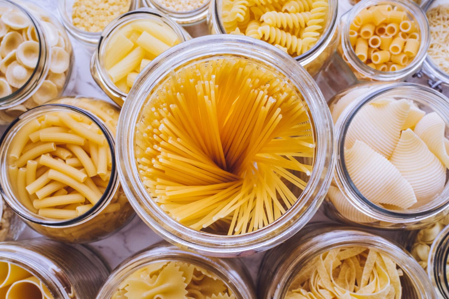 different pasta stored in jars