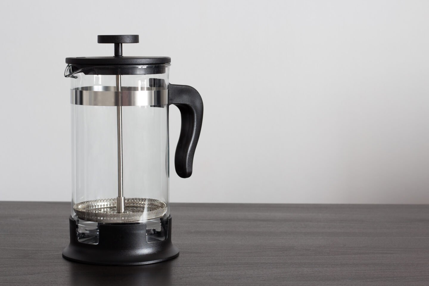 Empty,French,Press,On,A,Wooden,Table